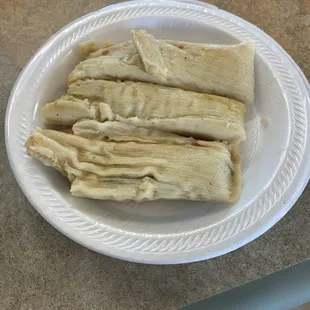 a plate of shredded chicken strips
