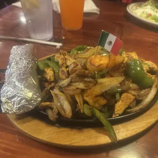 Steak, chicken and shrimp fajitas