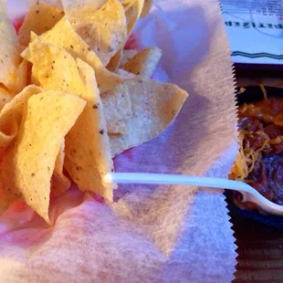 Yummy tortilla chips and refrained beans with cheese on top!