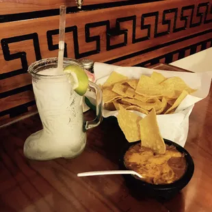 The Margaritas come in a cute boot glass. Each meal comes with bean and cheese dip as well as a salsa.