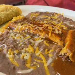 The Samuel (pork tamales, cheese enchilada and hard taco).