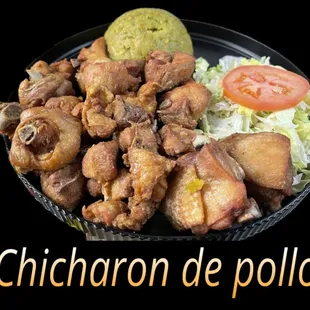 Fried chicken and green plantain mashed with garlic