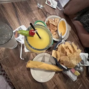 Top shelf margarita, queso with fresh crispy &amp; cooked chips, Chips and Salsa