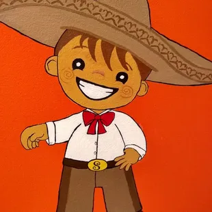 a boy in a sombren