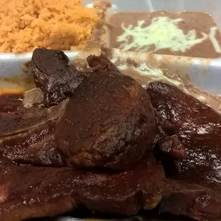 Wonderful Smoked Pork Chops in an amazing Red Sauce!!!  And a lot of pork chops as you can see.