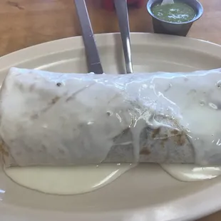Burrito with Asada and cheese sauce