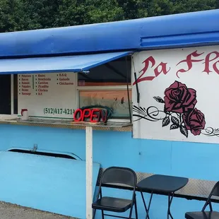 a blue and white food truck