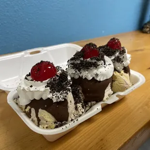 two desserts in a styrofoam container