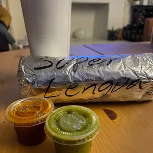 Super Burrito with Tongue, red and green salsa, and an horchata