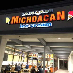 Front with patio tables.