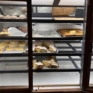 a display case full of pastries