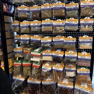 a shelf of dried herbs