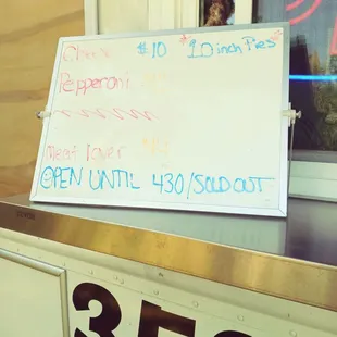 a sign in front of a window