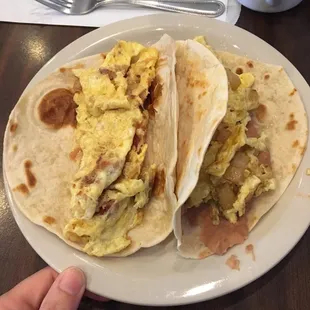 Breakfast tacos. Potato, egg &amp; beans. And bacon n egg.