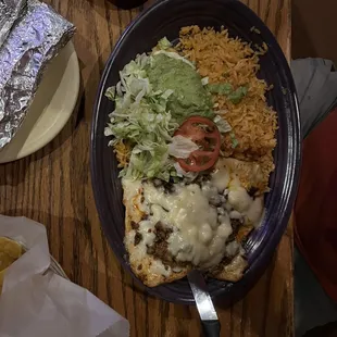 Chicken with pineapple and cheese, guacamole salad, rice