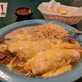 Chicken enchilada and beef burrito with rice &amp; beans.