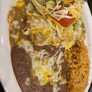 1 Chicken taco, 1 cheese enchilada combo comes with those famous beans and rice and yummy salty cheese that's melted to perfection.