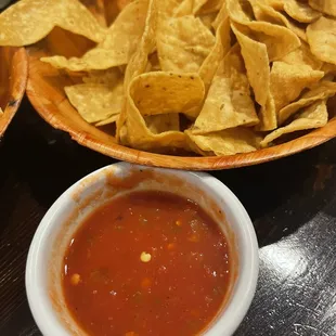 Always hot crispy home made tortilla strip chips and thick well seasoned, just a enough spice salsa, they have a hotter one if you ask.