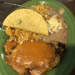 Chili relleno and taco lunch special with rice and beans