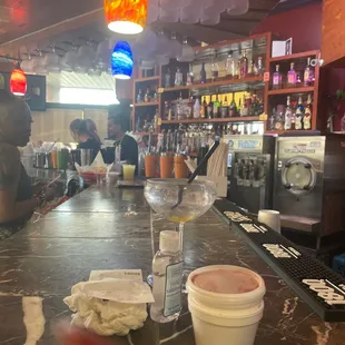 a bar with a glass of wine