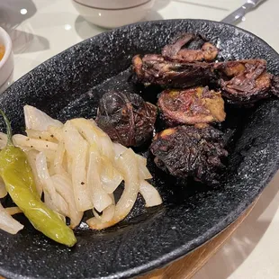 a plate of meat and vegetables
