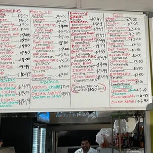 a menu on the wall of a restaurant
