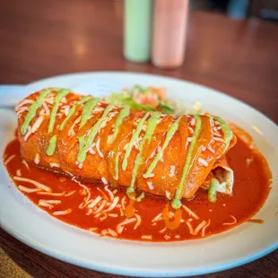 Burrito Mojado De Barbacoa In Red Sauce