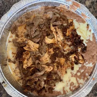 Poncheto with cheese sauce on top