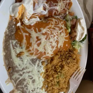 Enchilada, relleno ,rice and beans combo . Delicious!!