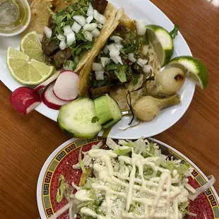 Lengua tacos and chicken tostada