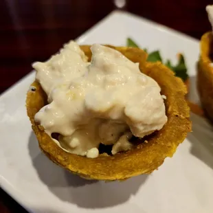 Garlic chicken tostone cup appetizer