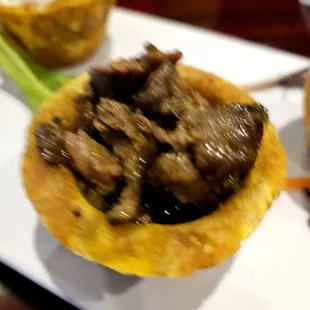 Skirt steak tostone cup appetizer