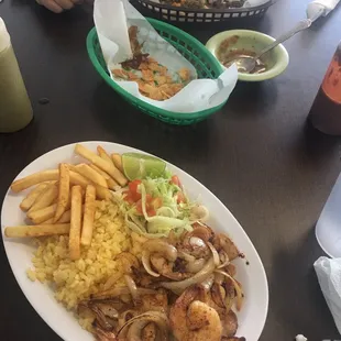 Grilled shrimp plate and 2 tacos. All delicious!