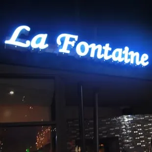 Our sign at night!