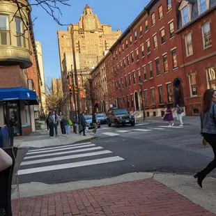 a woman walking down the street