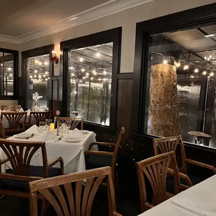 Dinning room overseeing GORGEOUS outside sitting area!