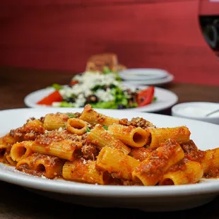 Rigatoni Bolognese - our housemade meat sauce finished with a dash of white truffle oil.