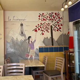 a table and chairs in a restaurant