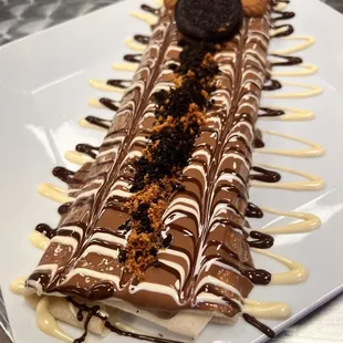 KC Crepe - fresh crepe filled with Nutella, Lotus, Oreo topped with Belgian chocolate!