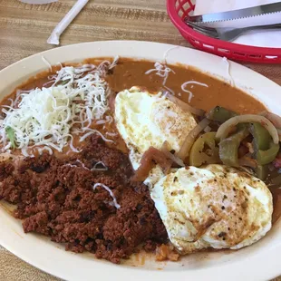 Huevos Rancheros--tasty eggs, beans, chorizo and salsa.