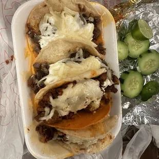 2 steak tacos 2 Al Pastor tacos