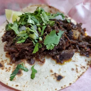 Brah!!! Really good taco de barbacoa de res