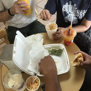 Mango boba in front, the red is mango chamoy, and the plain orange is mango smoothie.