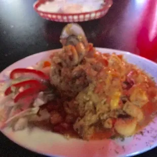 Mofongo with seafood. The pic it&apos;s a bit blurry but the flavor was outstanding