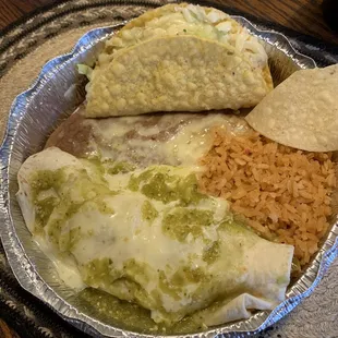 pork burrito, chicken taco with rice and beans.