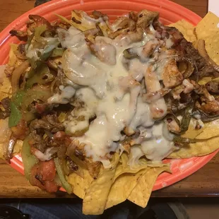 Fajita nachos with chicken and beef. The portion size is huge!
