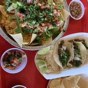 Tinga chicken  nachos and steak street tacos