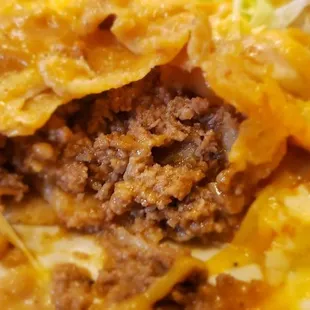 Ground beef enchilada with no sauce on it like most places