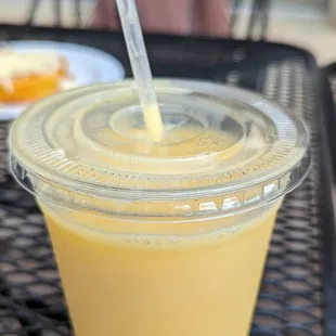 a smoothie in a plastic cup