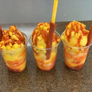 Mangoneada  handmade  ice cream with chopped mango  and sour sauce (chamoy)